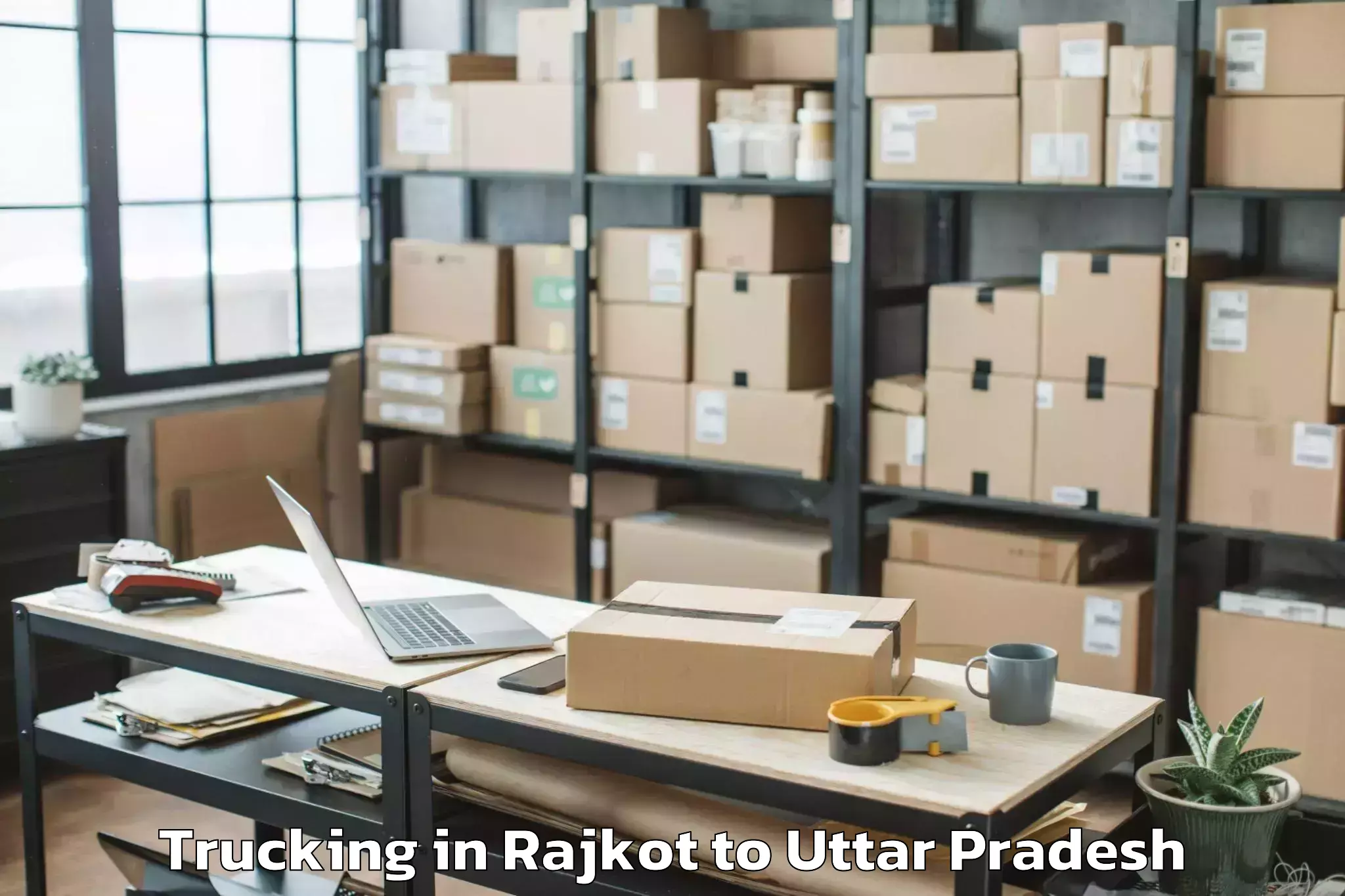 Top Rajkot to Ramkola Trucking Available